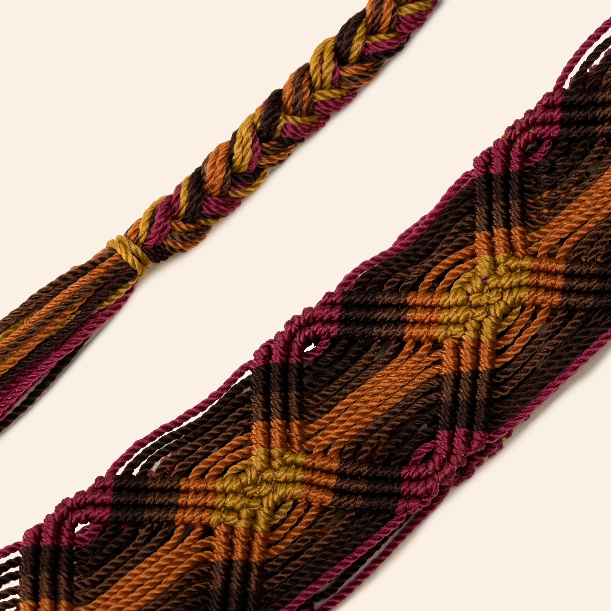 red and orange and brown phone and bag strap