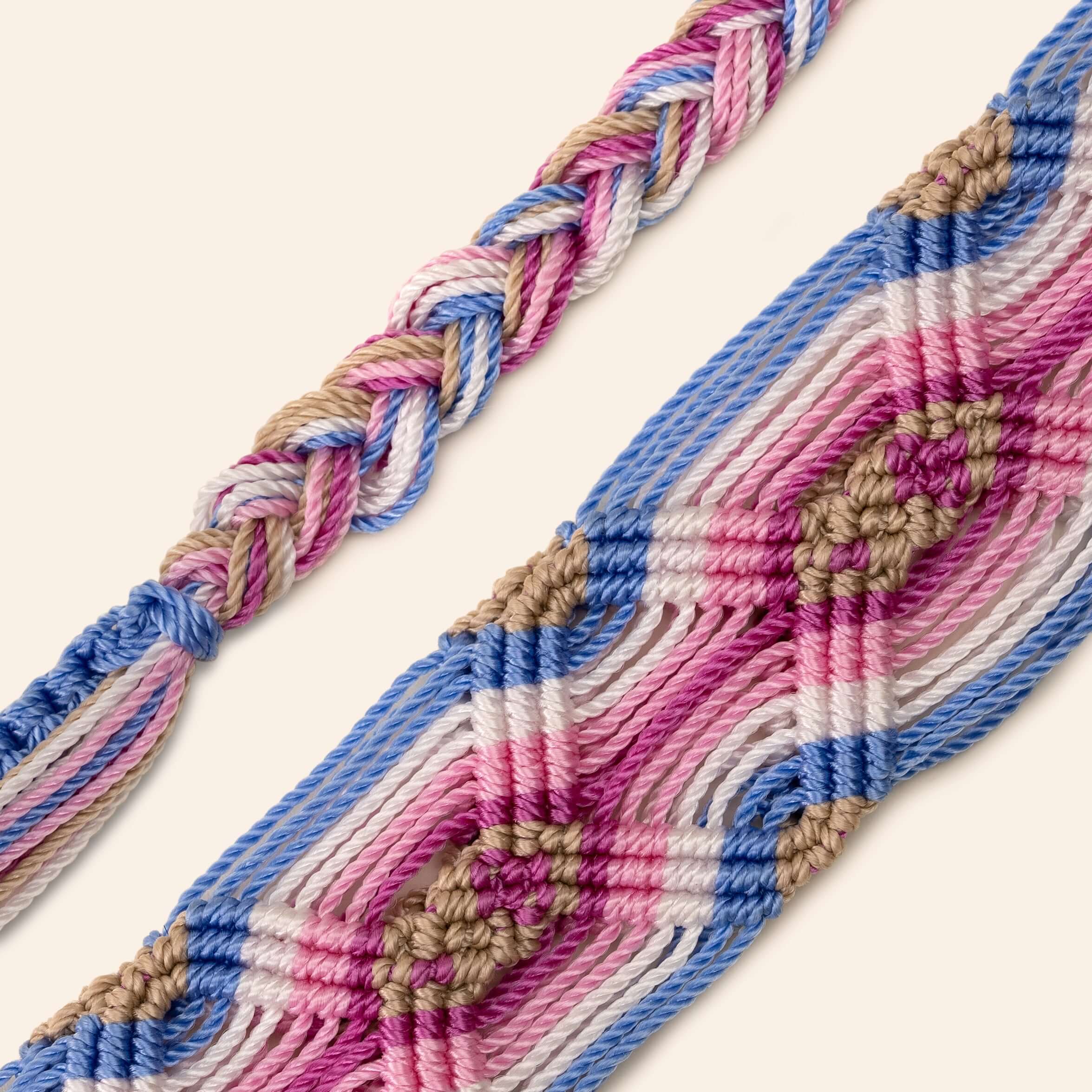 pink and blue phone and bag strap