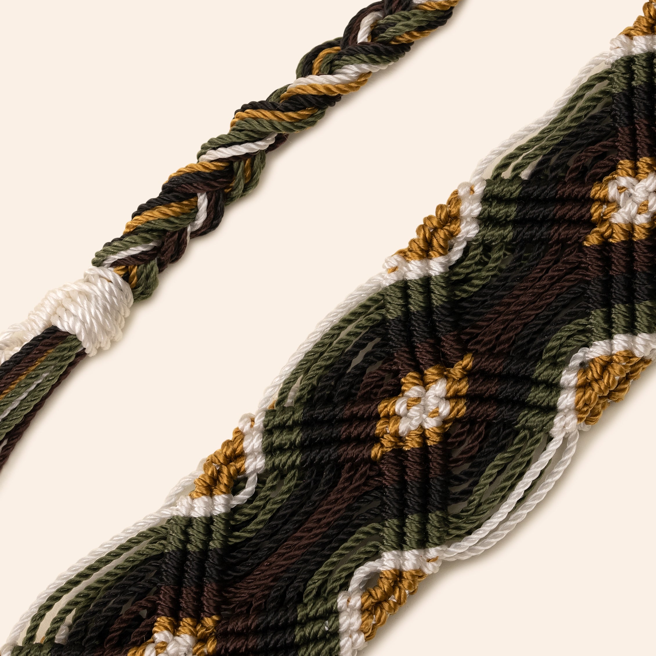green and brown and yellow phone and bag strap