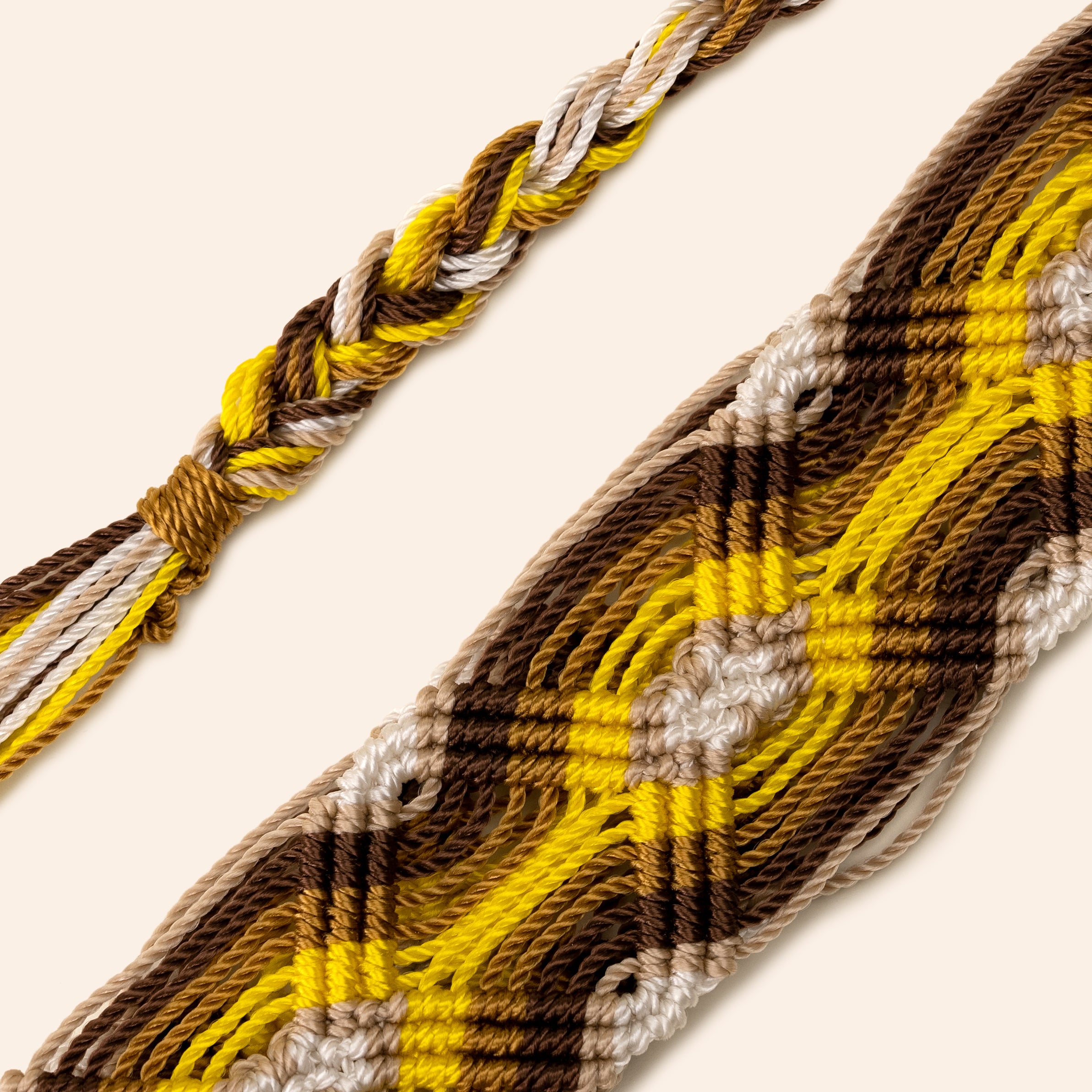 yellow and brown phone and bag strap