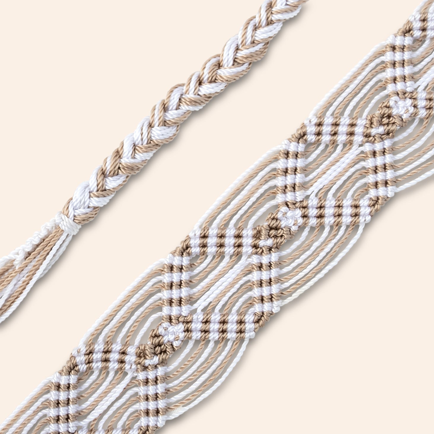 beige and white phone and bag strap